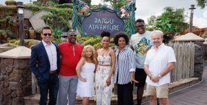 The Princess and the Frog cast members Bruno Campos, Keith David, Jennifer Cody, Anika Noni Rose, Jenifer Lewis, Michael-Leon Wooley, and Jim Cummings ride a log flume in Tiana's Bayou Adventure inside Magic Kingdom Park at Walt Disney World Resort.