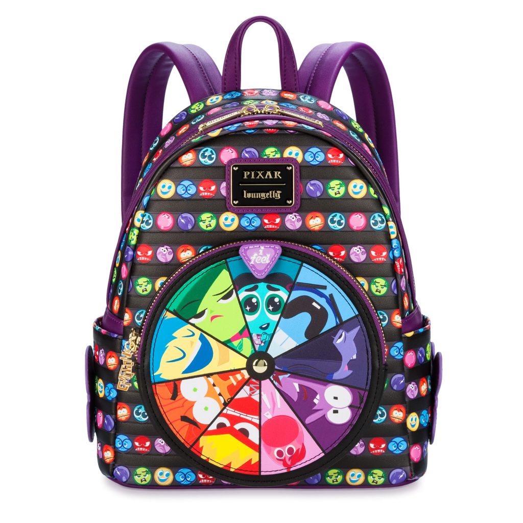 IO2 Loungefly sits on a plain white background. The bag has purple straps, a black base covered with circular images of all nine emotions, and a colorful wheel that features the same characters.