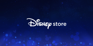 Logo of 'Disney Store' set against a starry night sky background with soft, glowing light effects and subtle Mickey Mouse silhouettes.