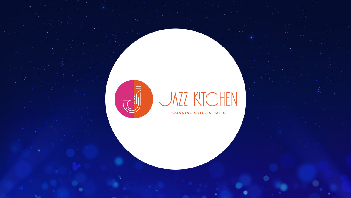 The image features a white circle centered on a deep blue background with subtle light effects and sparkling points. Inside the circle, the text "JAZZ KITCHEN" is displayed in an orange, uppercase font. Below "JAZZ KITCHEN" is the smaller text "COASTAL GRILL & PATIO" in orange, uppercase letters. To the left of the text is a circular logo divided into two halves: the left half is magenta, and the right half is orange. The logo features a stylized design of a saxophone in white.