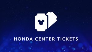 The image features a dark blue background with a scattering of light blue stars and bokeh effects, creating a magical and enchanting atmosphere. In the center, there are two white ticket icons, one overlapping the other. The front ticket has a cut-out silhouette of Mickey Mouse's head. Below the tickets, the text reads "HONDA CENTER TICKETS" in white, clear, and bold letters, indicating that this section or module is related to purchasing or managing tickets for events at the Honda Center.