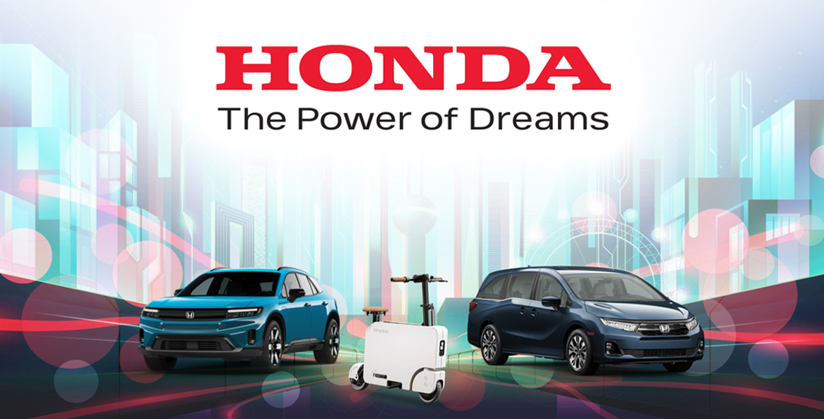 Graphic with a white and light blue background, featuring the Honda logo and the slogan 'The Power of Dreams' at the top. Below the text, there are images of two Honda vehicles and a scooter, with a futuristic cityscape in the background.