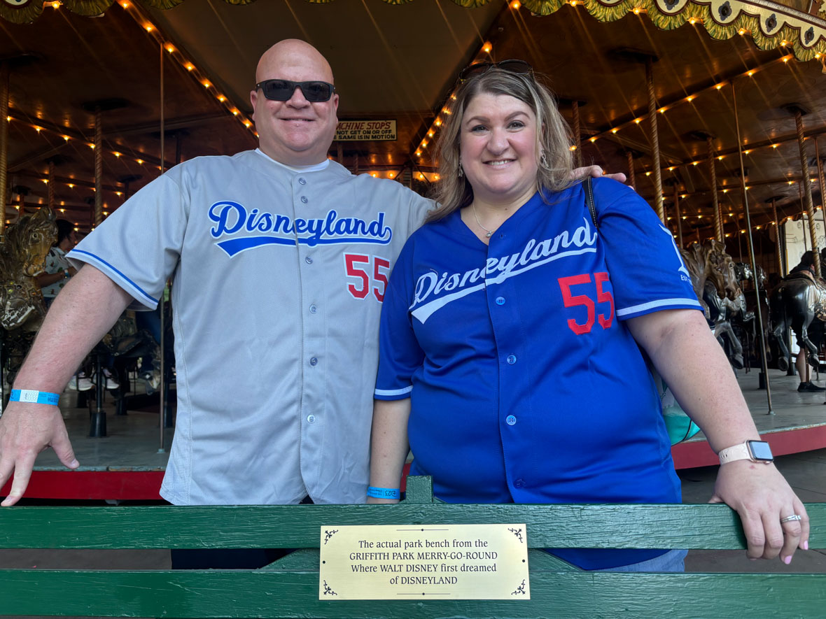 At D23’s recent 60th anniversary screening of Mary Poppins, D23 Members standing around a park bench and plaque that says, “The actual park bench from the Griffith Park Merry-Go-Round where Walt Disney first dreamed of Disneyland.”