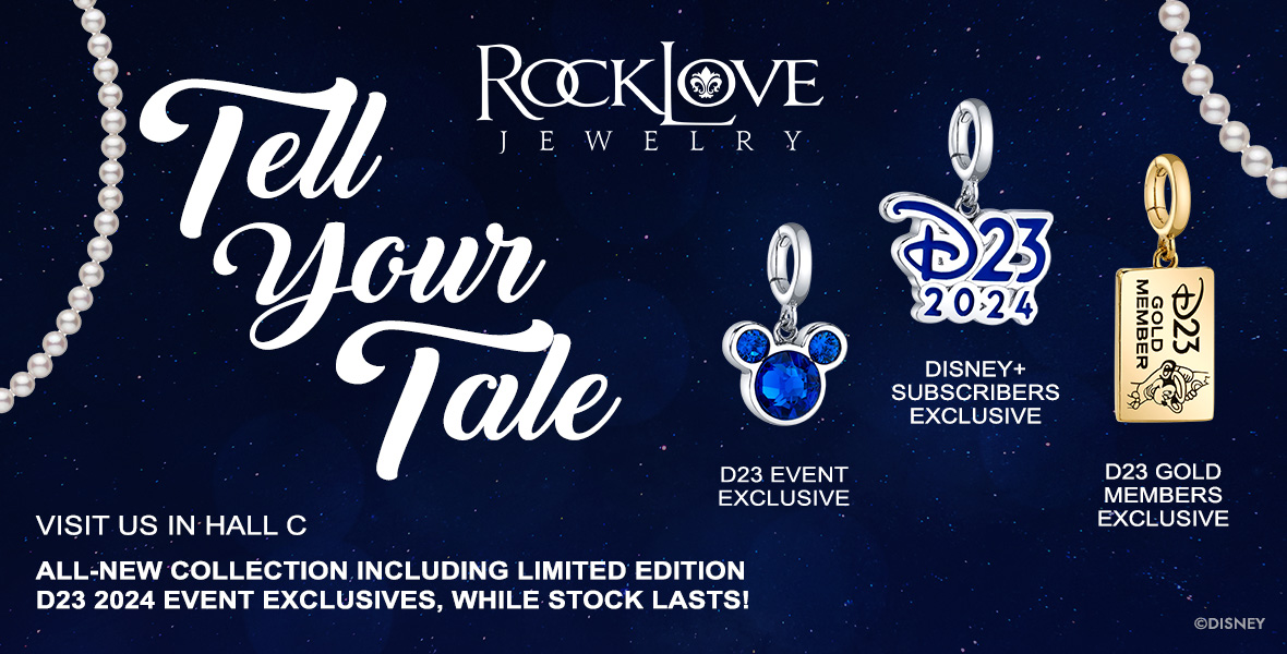 Promotional banner for RockLove Jewelry's 'Tell Your Tale' collection, featuring D23 2024 event exclusives. The image showcases three exclusive jewelry charms: a silver charm with a blue gemstone Mickey Mouse head, a silver 'D23 2024' charm for Disney+ subscribers, and a gold 'D23 Gold Member' charm with an engraving of Donald Duck. The banner invites viewers to visit Hall C to explore the all-new collection and limited edition items, with pearls adorning the sides of the banner.