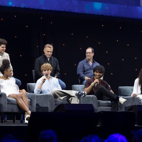 On Saturday, August 10, 2024, at the Anaheim Convention Center, fans of all ages and from around the world experienced the Percy Jackson and The Olympians Panel, which featured—pictured, from left to right—Charlie Bushnell, Toby Stephens, Leah Sava Jeffries, Dan Shotz (Executive Producer), Walker Scobell, Jonathan E. Steinberg (Co-Creator/Executive Producer), Aryan Simhadri, Craig Silverstein (Executive Producer), Dior Goodjohn, and Daniel Diemer.