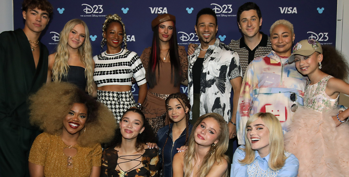 The panelists backstage before “Stay Tuned: You’re Watching Disney Channel” at D23: The Ultimate Disney Fan Event: (back row) Malachi Barton, Freya Skye, Monique Coleman, Kylie Cantrall, Corbin Bleu, David Henrie, Raven-Symoné, and Mykal-Michelle Harris; (front row) Dara Reneé, Malia Baker, Janice LeAnn Brown, Ruby Rose Turner, and Meg Donnelly.