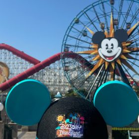 D23 Day at Disneyland Resort event blue and black Mickey Ear Hat in Disney California Adventure with the Incredicoaster and Pixar Pal-A-Round visible behind the hat.