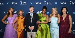 Disney Legends Jodi Benson, Paige O'Hara, Mark Henn, Anika Noni Rose, Linda Larkin, and Ming Na-Wen pose on the red carpet at D23: The Ultimate Disney Fan Event.