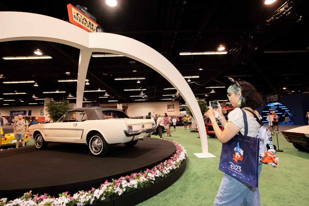 A Ford Mustang, used inside the Ford’s Magic Skyway pavilion at the 1964-1965 New York World’s Fair, is seen on the show floor in “A Great Big Beautiful Car Show” at D23: The Ultimate Disney Fan Event.