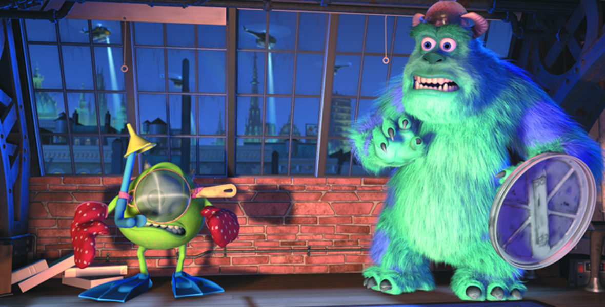 In a scene from Monsters, Inc. Mike Wazowski (left; voiced by Disney Legend Billy Crystal), a green, one-eyed, round monster, and James P. “Sully” Sullivan (right; voiced by Disney Legend John Goodman), a large, hairy, cyan-blue monster, are standing in a room. Mike is wearing blue swim fins, red and white polka dot mittens, and a snorkel swimming mask. Sully holds a large metallic lid as a shield and wears a strainer basket as a helmet. They booth stare slightly to their right with scared expressions.