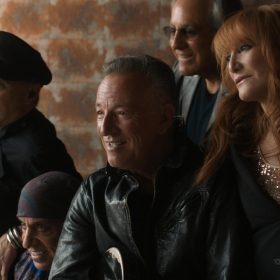 Garry Tallent, Nils Lofgren, Steven Van Zandt, Bruce Springsteen, Max Weinberg, Patti Scialfa, and Roy Bittan seen in Road Diary: Bruce Springsteen and The E Street Band