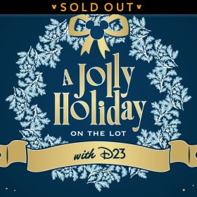 A light blue Christmas wreath against a dark blue background, with golden Mickey sparkles around the border. Inside the wreath it reads “A Jolly Holiday on the Lot.” There is a golden bow on the top of the wreath, and a golden ribbon at the bottom with the text “with D23” inside of it. A banner at the top reads "SOLD OUT".