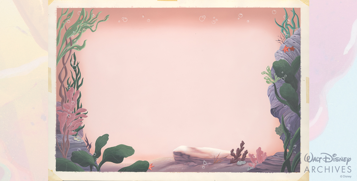 Undersea, pink-toned sunset background with a view of the sea floor with rocks, coral, and seaweed. 