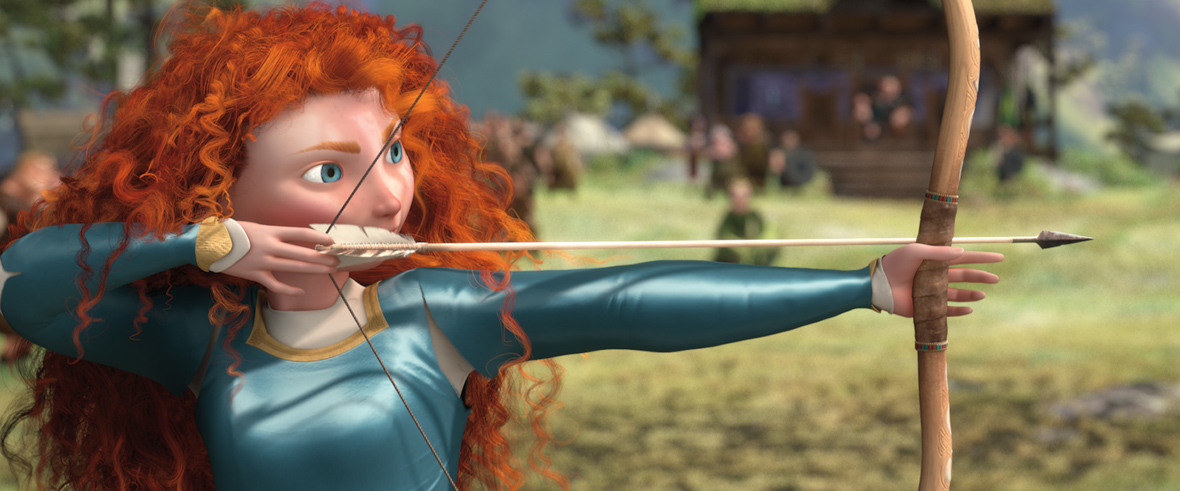 In a scene from Brave, Merida (voiced by Kelly Macdonald) draws an arrow while holding her bow, her gaze focused intently on her target. She wears a long-sleeve, blue dress with a satin-like sheen, accented by white and gold details. In the blurred background, a male warrior watches Merida with interest.