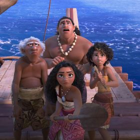 Moni (voiced by Hualalai Chung), Loto (voiced by Rose Matafeo), and Moana (voiced by Auli‘i Cravalho) stand as a group on their boat, looking up with trepidation at an offscreen enemy. Moana is holding out her oar defensively.