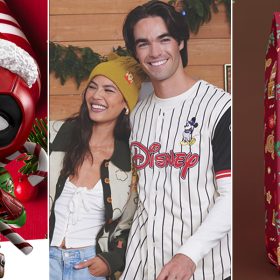 A figurine of Deadpool from Iron Studios is decked out with a Santa hat, green and red festive sweater with interlocked candy cakes in the background; Two models, one woman and man, are adorned with BoxLunch Disney apparel, and smile at the camera. A backdrop of a holiday wreath and other evergreen is behind them with copy that reads “25 % off your next purchase”: a bag of Joffrey’s Disney Princess Gingerbread Castle holiday blend is prominently displayed.