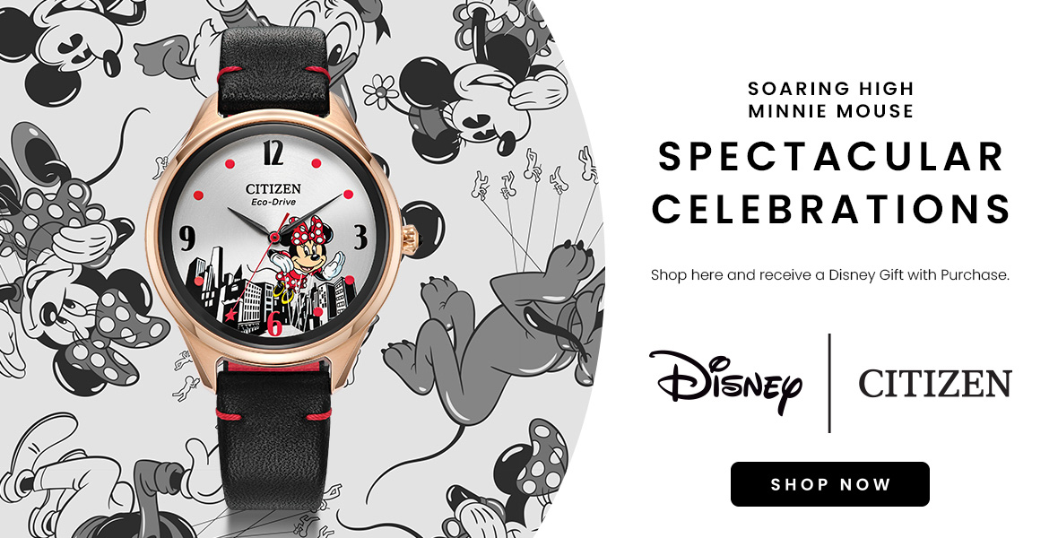 This promo image features the new, exclusive Soaring High Minnie Mouse watch set against a platinum background with illustrations of Micky and Minnie Mouse, Pluto and Donald balloons on the left-hand side. At right in black lettering the copy reads “Soaring High Minnie Mouse” at top, then “Spectacular Celebrations” and then in smaller lettering “Shop here and receive a Disney Gift with Purchase.” Then the logos for Disney and Citizen and, the words “Shop Now” in a black rectangle. 