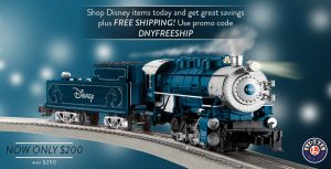 Lionel Trains exclusive D23 locomotive and rolling stock is featured in action, rolling down a silver track.