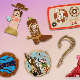 Image showcasing D23-exclusive items including the Enchanted Objects pins; the Sorcerer Apprentice Mickey Mouse Collectible Figurine as the Scarlet Glitter Variant; the Toy Story 2 25th Anniversary Woody’s Roundup Pin Set; the 20,000 Leagues Under the Sea 70th anniversary pin; and the Fantastic Mr. Fox 15th anniversary pin.