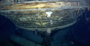 In an image from National Geographic’s Endurance, the stern of the Endurance is seen underwater, with the name and emblematic polestar at center.