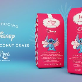 Two red Joffrey’s Coffee bags showcase Stitch in front of two white flower silhouettes. Each bag features the Joffrey’s logo and the Disney logo, below which is an image of Stitch and the name of the coffee and its description: “Stitch Coconut Craze; Deviously delicious notes of creamy coconut and graham cracker; naturally & artificially flavored ground coffee; medium roast.” To the left of the bags, text reads “Introducing Disney Stitch Coconut Craze; Joffrey Coffee & Tea Company.”