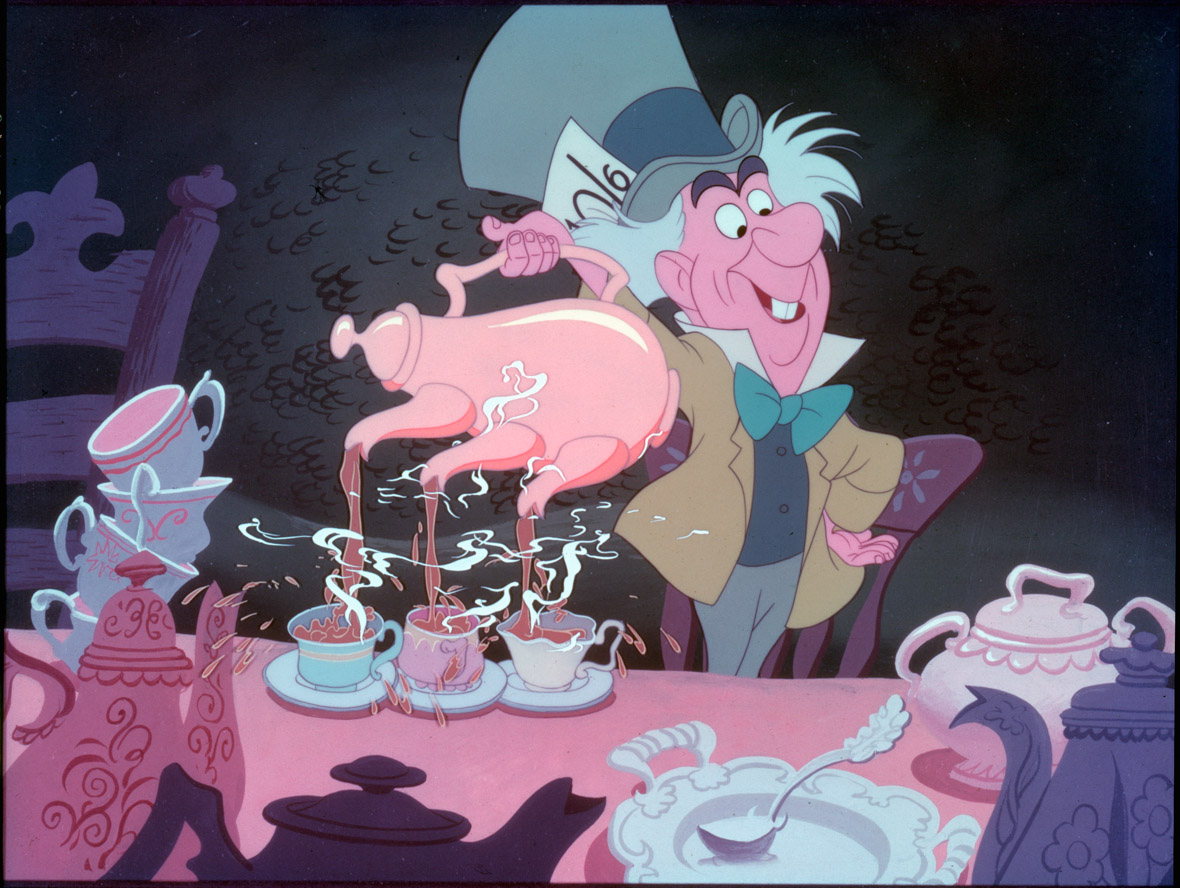 An image of the Mad Hatter (voiced by Disney Legend Ed Wynn) from Alice in Wonderland. He’s pouring tea from a three-spouted tea kettle into three different teacups.