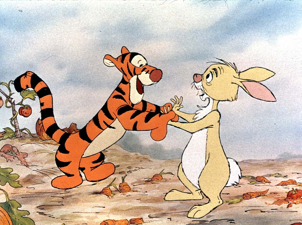 In an image from Winnie the Pooh and the Blustery Day, Tigger (voiced by Paul Winchell) is shaking hands with Rabbit (voiced by Junius Matthews).