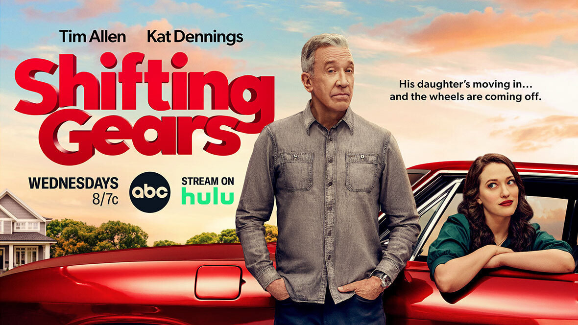 A promotional image for Shifting Gears features Tim Allen as Matt and Kat Dennings as Riley, in a red car behind Allen. The poster reads “Shifting Gears” in large red letters, and other details. The background features a sky around sunset.