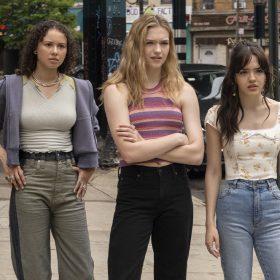 In an image from Goosebumps: The Vanishing, C.J. (Elijah M. Cooper), Alex (Francesca Noel), Cece (Jayden Bartels), Frankie (Galilea La Salvia), and Trey (Stony Blyden) all stand in a line on the sidewalk, staring with concerned and perplexed expressions at something offscreen.