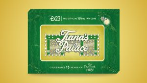 A limited-edition D23 exclusive pin celebrating the 15th anniversary of Disney's The Princess and the Frog. The pin features an ornate design with the words 'Tiana&rsquo;s Palace' in elegant script, surrounded by decorative elements reminiscent of New Orleans architecture, including green, gold, and white accents. The pin is displayed in a green collector&rsquo;s box with gold detailing, featuring the D23 logo, a firefly illustration of Ray, and the text 'Celebrates 15 Years of The Princess and the Frog' at the bottom.