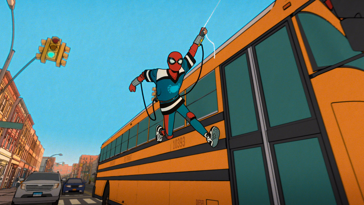 Peter Parker/Spider-Man (Hudson Thames) runs alongside a yellow school bus.