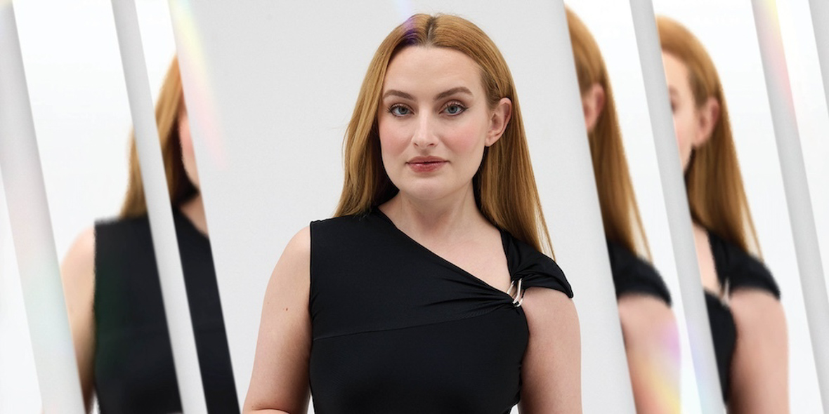 Amelia Dimoldenberg wears a sleeveless black dress.