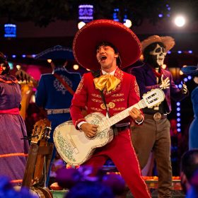 Aboard the Disney Treasure, the vibrant town of Santa Cecilia awakens at Plaza De Coco, the first theatrical dining experience themed to Disney and Pixar's Coco.