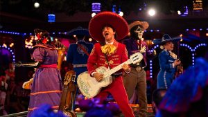 Aboard the Disney Treasure, the vibrant town of Santa Cecilia awakens at Plaza De Coco, the first theatrical dining experience themed to Disney and Pixar's Coco.