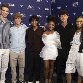 Daniel Diemer, Walker Scobell, Aryan Simhadri, Leah Sava Jeffries, Charlie Bushnell, and Dior Goodjohn take a group photo at D23: The Ultimate Disney Fan Event.