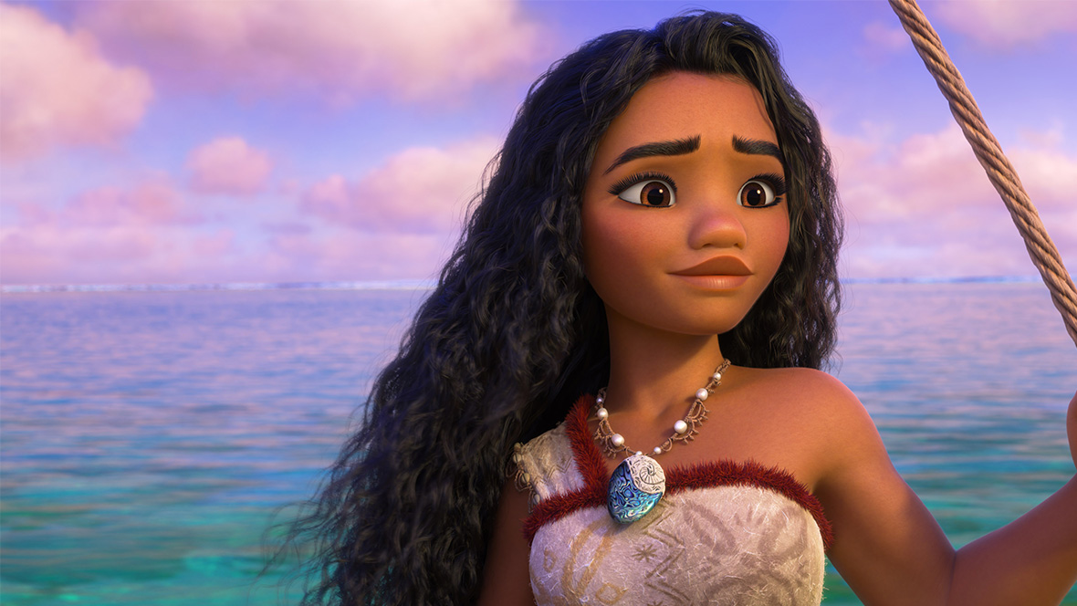 Moana from Moana 2, staring out at the ocean with a rope in her hand.