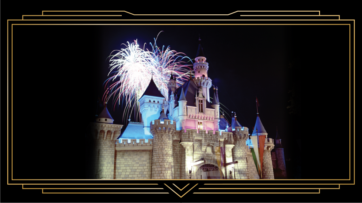A vintage photograph of Sleeping Beauty Castle at Disneyland Resort, with fireworks in the sky.
