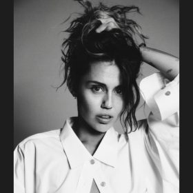 Headshot of Miley Cyrus.