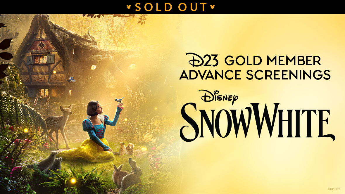 A promotional image featuring Rachel Zegler playing Snow White kneeling in the middle of a lush green meadow surrounded by squirrels, rabbits, raccoons, a deer, and bluebirds. She is looking up at a blue bird perched on her finger and is wearing a dress with a blue bodice and yellow skirt. To the right of the image is black text that reads D23 Gold Member Advance Screenings Disney Snow White against a golden background.