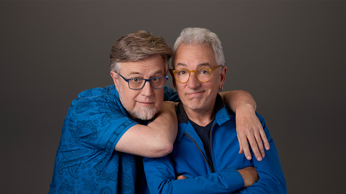 (L-R) Dan Povenmire and Jeff "Swampy" Marsh wear matching blue shirts.