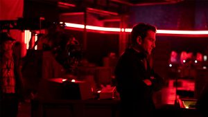 Director Jake Schreier looks at a monitor on the set of Marvel Studios' Thunderbolts*.