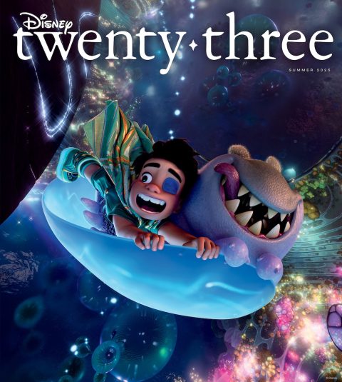 Cover of the Disney twenty-three Summer 2025 issue featuring Elio and a grinning alien companion from Pixar's upcoming film Elio, soaring through a vibrant, cosmic landscape filled with glowing shapes and floating bubbles.