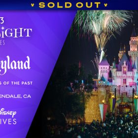 A promotional image for the D23 Spotlight Series and Walt Disney Archives event, “Disneyland— Fond Memories of the Past” on July 19 in Glendale, California. The D23, Disneyland and Walt Disney Archives logos are in white text on a blue and purple background. The right half of the image is a nighttime image of Disneyland’s Sleeping Beauty Castle, with a large crowd gathered around it and green and orange fireworks in the sky. A banner at the top reads "SOLD OUT."