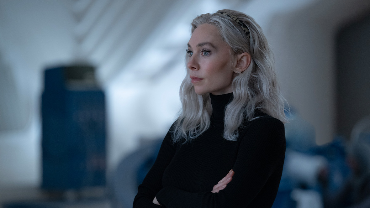 Sue Storm/Invisible Woman (Vanessa Kirby) crosses her arms in a scene from Marvel Studios' The Fantastic Four: First Steps.