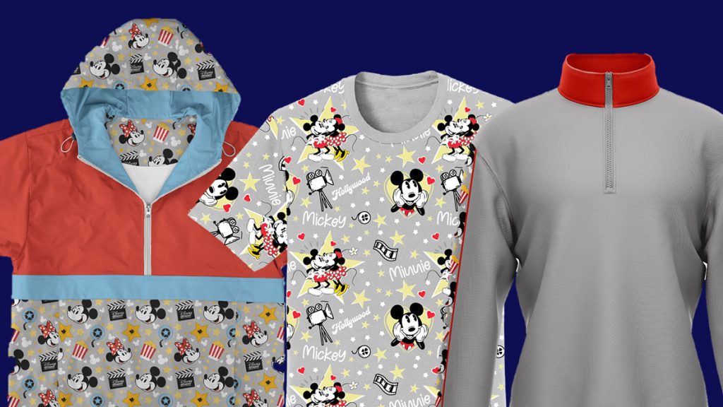 An image displaying several items that will be available at the Disney Studio Store Hollywood during the D23 Shopping Spree at Destination D23—including a red, blue, and gray hoodie featuring Mickey Mouse (left); a gray T-shirt with a Mickey Mouse all-over print (middle); and a gray half-zip pullover with Mickey Mouse on the sleeve (right).