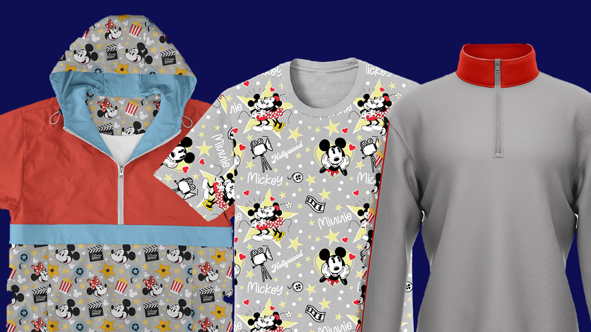 An image displaying several items that will be available at the Disney Studio Store Hollywood during the D23 Shopping Spree at Destination D23—including a red, blue, and gray hoodie featuring Mickey Mouse (left); a gray T-shirt with a Mickey Mouse all-over print (middle); and a gray half-zip pullover with Mickey Mouse on the sleeve (right).