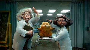 Two female scientists in lab coats and glasses stand on either side of a lab table, show off a robotic beaver, with its front paws outstretched, is displayed on a charging base at center. A chalkboard with diagrams is at left and curtains are pulled back at either side, showing a room with monitors and florescent lighting.