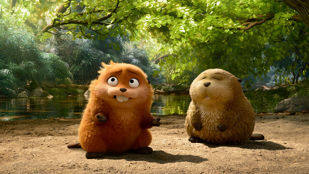 (L-R) A robotic beaver, imbued with the human consciousness of Mabel (voiced by Piper Curda) sits on the bank of a pond with a beaver, which is lighter in color. The robotic beaver is looking at something off-screen, while the other has its eyes closed. Green foliage and a dam are in the background.
