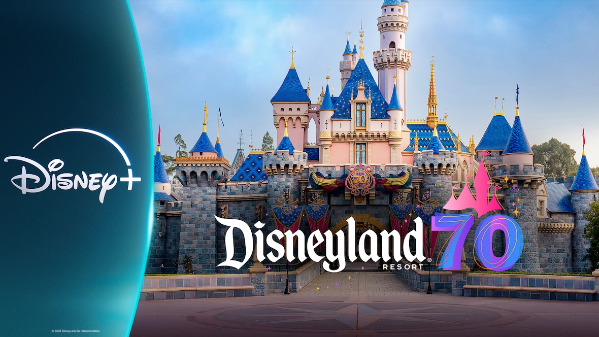 Sleeping Beauty Castle at Disneyland Resort decorated for the 70th anniversary celebration, with vibrant blue and gold accents and a 70th emblem overlay. The image features the Disneyland Resort 70 and Disney+ logos, representing a collaboration between the park and the streaming service.