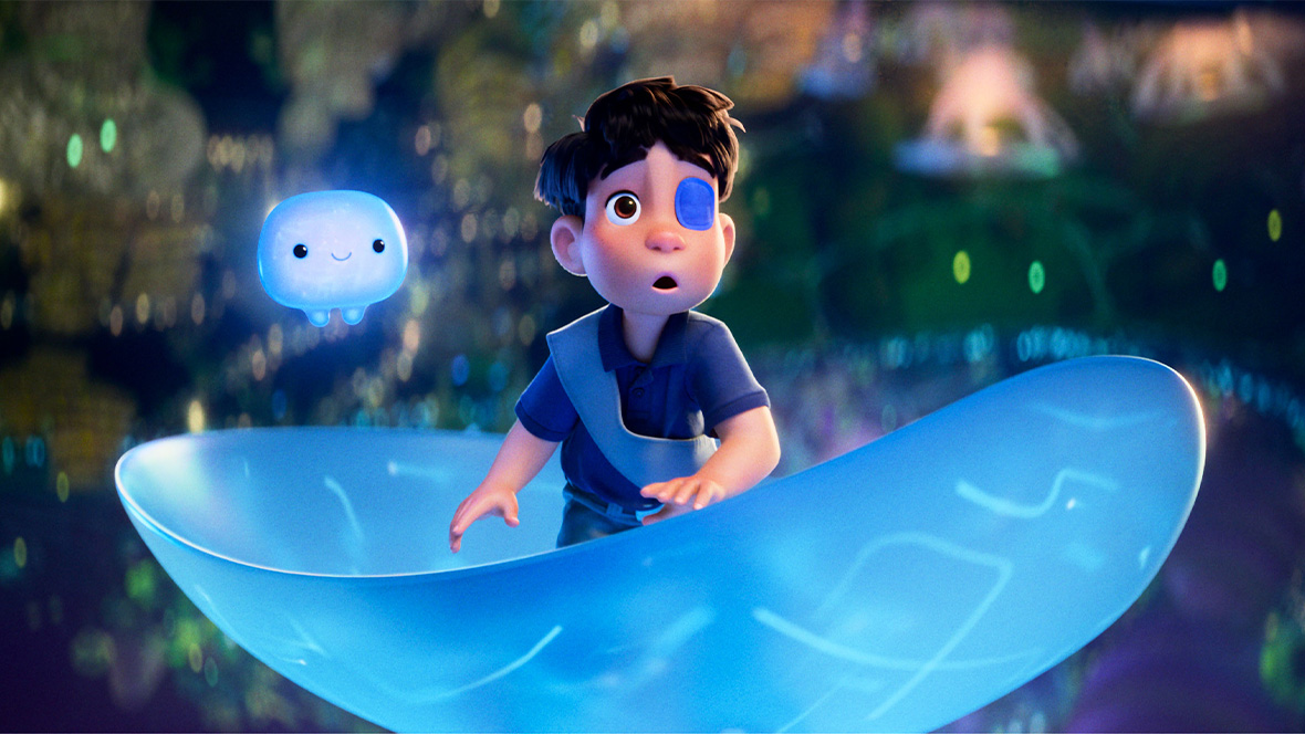 In a still from Disney and Pixar’s Elio, Ooooo (voiced by Shirley Henderson), left, is riding through the Communiverse alongside Elio (voiced by Yonas Kibreab), right. Ooooo is a small, round-cornered, light blue, box-shaped supercomputer with two large black eyes and a thin mouth. Two small legs are seen at the bottom of its body. It floats alongside as Elio travels in a similarly colored cup-shaped vehicle.